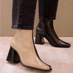 Alohas Bicolor Patent Heeled Boot - Beige and Black. Never worn